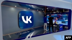 FILE - The logo of Russian social media platform VK (formerly VKontakte), is seen during the St. Petersburg International Economic Forum in St. Petersburg, Russia, June 15, 2022. 