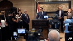 U.S. special envoy Amos Hochstein, center, speaks to the media after his meeting with Lebanese Parliament Speaker Nabih Berri in Beirut, Lebanon, June 18, 2024.