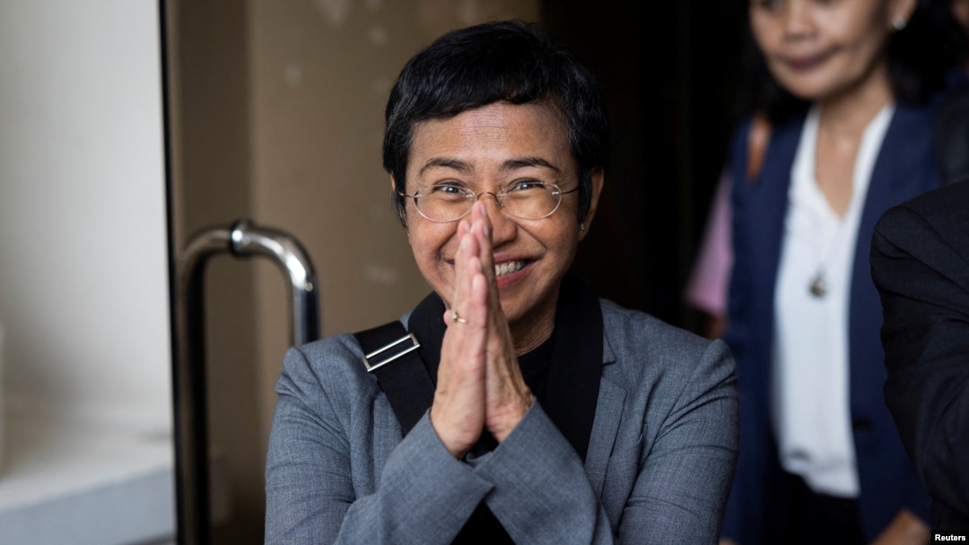 FILE - Philippines Nobel laureate Maria Ressa faces the media after she and her news site Rappler were acquitted of tax fraud, in Pasig City, Metro Manila, Philippines, Sept. 12, 2023. On Dec. 12, 2023, the Philippine Justice Department dropped a criminal case against Ressa.