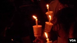 Families of trafficking victims have held demonstrations including this candlelight vigil in Malaysia. (Dave Grunebaum/VOA)