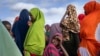 Somali women are seen at a camp for displaced people on the outskirts of Dollow, Somalia, Sept. 19, 2022. Women and girls in displaced communities in Somalia are experiencing a spike in gender-bases violence, according to U.N. data.