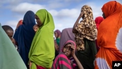 Somali women are seen at a camp for displaced people on the outskirts of Dollow, Somalia, Sept. 19, 2022. Women and girls in displaced communities in Somalia are experiencing a spike in gender-bases violence, according to U.N. data.