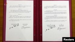 19일 블라디미르 푸틴 러시아 대통령과 김정은 북한 국무위원장이 서명한 포괄적 전략 동반자 관계에 관한 조약 문서.