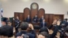 Judge Yelubay Abibullayev delivers the verdict on the criminal cases of 22 Karakalpaks, in Bukhara, Uzbekistan, Jan. 31, 2023. (Uzbekistan's Ombudsman)