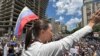 La líder de la oposición venezolana María Corian Machado participa en una marcha en Caracas el sábado, 17 de Agosto de 2024.