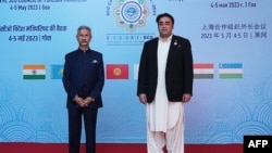 This handout photo taken May 5, 2023, shows India's Foreign Minister Subrahmanyam Jaishankar, left, and Pakistan's Foreign Minister Bilawal Bhutto Zardari during the Shanghai Cooperation Organization's foreign ministers meeting in Benaulim village, South Goa district, India. (Indian Ministry of External Affairs)