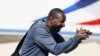 FILE - Freed French hostage journalist Olivier Dubois, who was held hostage in Mali for nearly two years by the Support Group for Islam and Muslims reacts as he arrives at the Villacoublay airport, in Velizy-Villacoublay, near Paris, March 21, 2023.