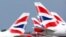 FILE: Ekor pesawat milik maskapai penerbangan British Airways di Bandara Heathrow, London, Inggris, 17 Mei 2021. (REUTERS/John Sibley)
