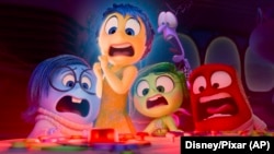 This image released by Disney/Pixar shows, from left, Sadness, voiced by Phyllis Smith, Joy, voiced by Amy Poehler, Disgust, voiced by Liza Lapira, Fear, voiced by Tony Hale and Anger, voiced by Lewis Black, in a scene from "Inside Out 2."
