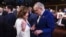 FILE - Then-House Speaker Nancy Pelosi, left, and Senate Majority Leader Chuck Schumer speak before President Joe Biden delivers the State of the Union address to a joint session of Congress at the Capitol, March 7, 2024, in Washington. 