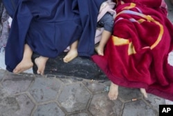 Tijela ubijene palestinske dece u Pojasu Gaze. (foto: AP/Hatem Moussa)