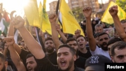 Supporters of Hamas and Hezbollah shout during a protest condemning the killing of Hamas leader Ismail Haniyeh and Hezbollah top commander Fuad Shukr, in Sidon, Lebanon, Aug. 2, 2024.