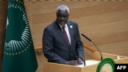 FILE - Chairperson of the African Union Commission Moussa Faki delivers a speech to the 37th Ordinary Session of the Assembly of the African Union (AU) at the AU headquarters in Addis Ababa on February 17, 2024. 