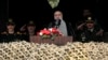 Iranian President Ebrahim Raisi speaks during Army Day parade at a military base in northern Tehran, April 17, 2024. 