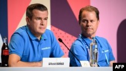 World Anti-Doping Agency (WADA) President Witold Banka (L) and WADA's Director General Olivier Niggli attend a press conference ahead of the Paris 2024 Olympic Games in Paris, France, July 25, 2024. 