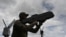 FILE - A Ukrainian serviceman tests an anti-drone gun during a presentation of radio-electronic warfare (WB) and radio-electronic intelligence (PER) systems of the Ukrainian company Kvertus in Lviv region on May 28, 2024.