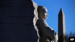 FILE - The Martin Luther King Jr. Memorial with the Washington Monument in the background on Jan. 21, 2019, in Washington. 