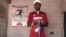 Chipo Tsodzo displaying some of his trophies and prizes