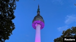 The N Seoul Tower, also known as Namsan Tower, lights up in purple to celebrate K-pop group BTS' 10th anniversary of their debut, in Seoul, South Korea June 12, 2023.