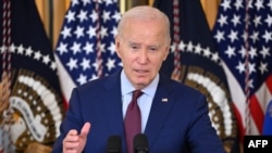 U.S. President Joe Biden speaks during a meeting of his Competition Council in the State Dining Room of the White House in Washington, July 19, 2023. Biden said he would travel to Vietnam "shortly" as part of an effort to improve ties with Hanoi.