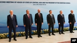 FILE - From left, the presidents of Kazakhstan, Tajikistan, the European Council, Kyrgyzstan and Uzbekistan and Turkmenistan's deputy cabinet chairman are pictured ahead of a meeting in Cholpon-Ata, Kyrgyzstan, June 2, 2023. 