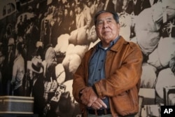 Ron Wakabayashi poses for a picture at the Japanese American National Museum in Los Angeles, Feb. 11, 2023.