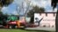 FILE - A mural is displayed as a Black History Month Memorial Ride is held in memory of those who have died through race-related violence, organized by the family of shot Black man Ahmaud Arbery, in Brunswick, Georgia, U.S., Feb.27, 2021. 