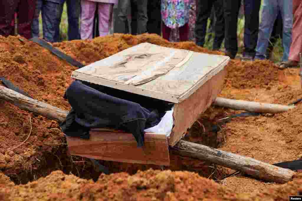 The coffin of Emmanuel Dennis, one of the children killed in the Saint Academy collapse, is seen during his funeral in Jos, Plateau state, Nigeria.