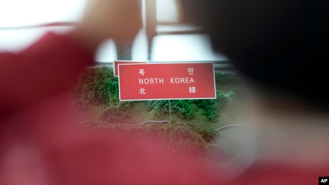 FILE - A sign for North Korea is seen on a map at the unification observatory in Paju, South Korea, Nov. 22, 2023.