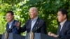 FILE - From left, South Korean President Yoon Suk Yeol, U.S. President Joe Biden and Japanese Prime Minister Fumio Kishida speak to reporters Aug. 18, 2023, at Camp David in Maryland. The three countries held their first trilateral Indo-Pacific Dialogue last week in Washington.