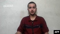 A still from a video released by the Palestinian militant group Hamas on April 24, 2024, shows a man who identified himself as Hersh Goldberg-Polin, one of the hostages abducted from a music festival in Israel during the Hamas attack on Oct. 7, 2023.