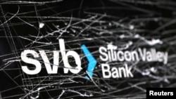 FILE - Destroyed SVB (Silicon Valley Bank) logo is seen in this illustration taken March 13, 2023.