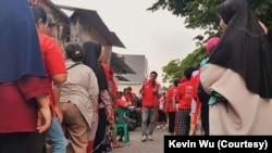 Kevin Wu campaigns in Wijaya Kusuma Sub District, West Jakarta, on Feb. 9, 2024.