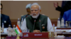 In this image taken from video, the placard in front of Prime Minister Narendra Modi at the G20 summit in New Dehli on Sept. 9, 2023, reads “Bharat” instead of “India."