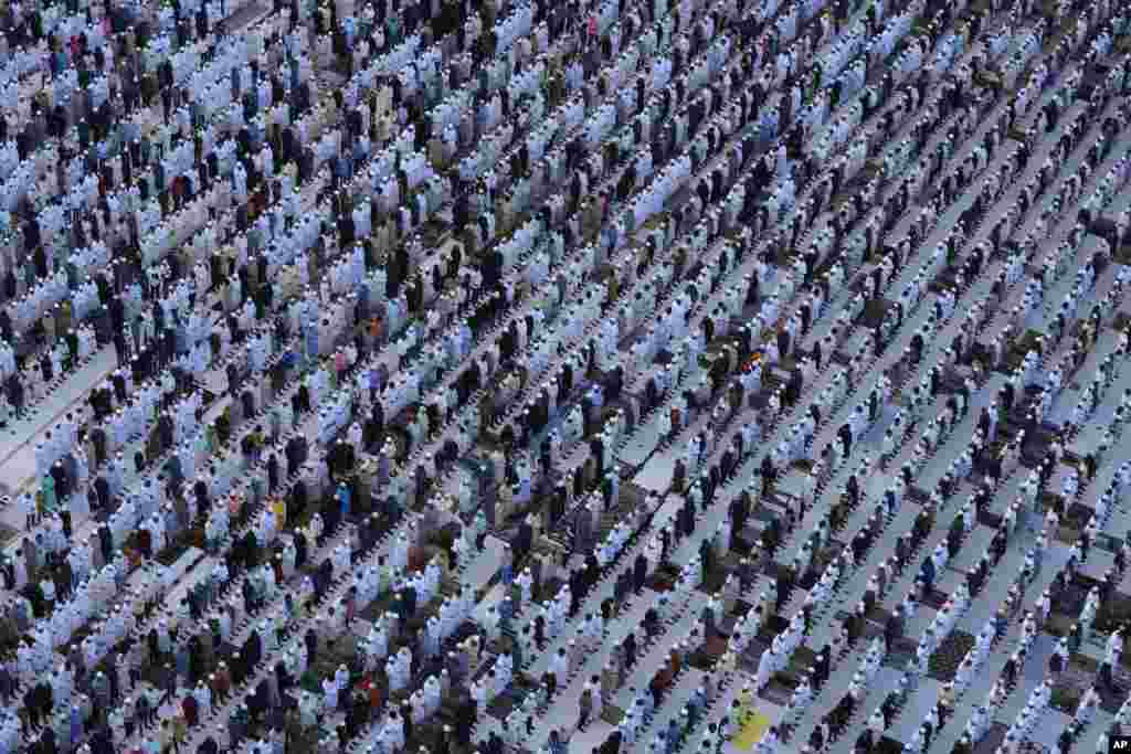 Devout Muslims offer Eid al-Fitr prayer, marking the end of the fasting month of Ramadan in Mumbai, India.