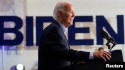 President Joe Biden looks on as he speaks during a campaign event at Sherman Middle School in Madison, Wisconsin, July 5, 2024.