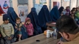 Afghan women and children refugees deported from Pakistan wait in a nutrition ward at the United Nations High Commissioner for Refugees camp on the outskirts of Kabul, Afghanistan, Jan. 9, 2024.