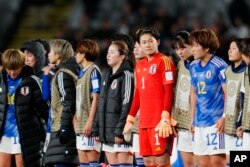 Japan players react at the end of the Women's World Cup quarterfinal soccer match between Japan and Sweden at Eden Park in Auckland, New Zealand, Aug. 11, 2023. Sweden won 2-1.