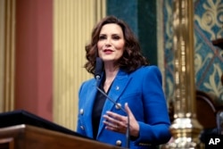 FILE - Michigan Gov. Gretchen Whitmer delivers her State of the State address to a joint session of the House and Senate, Jan. 25, 2023, at the state Capitol in Lansing, Mich.