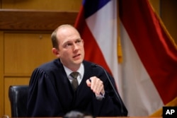 Fulton County Superior Judge Scott McAfee presides in court, in Atlanta, Georgia, March, 1, 2024.
