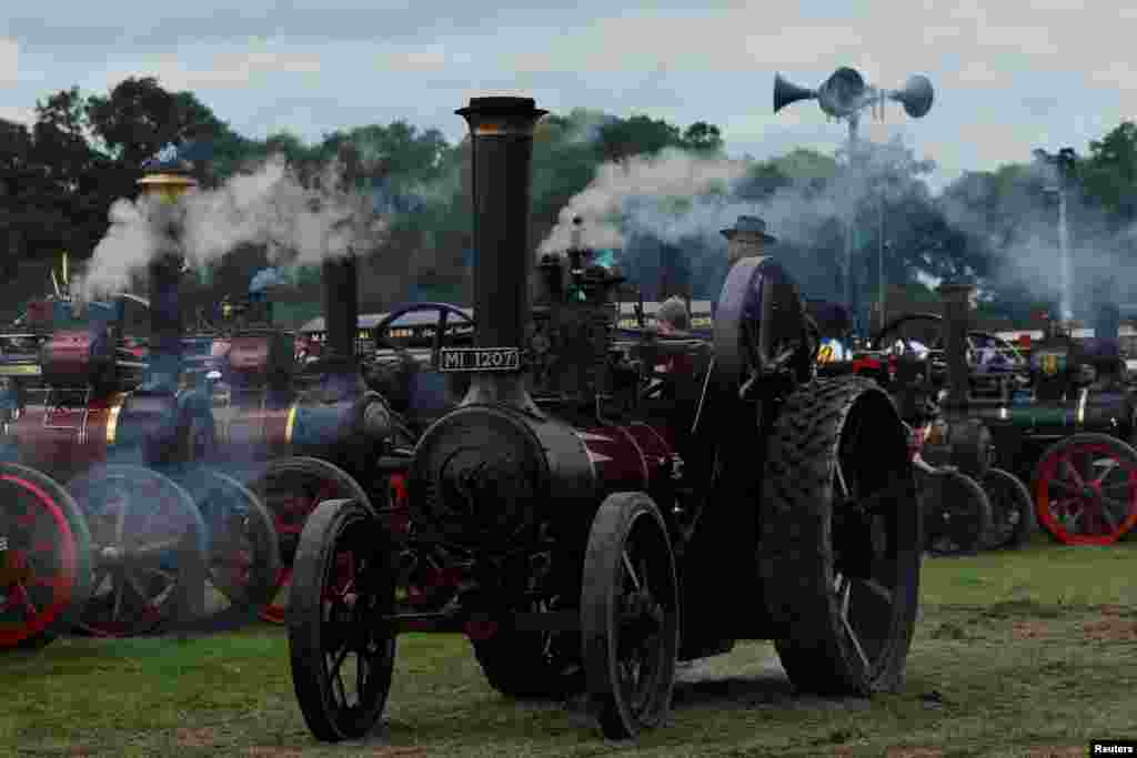 Participants line up their steamers during a vintage steam rally organized by the Irish Steam Preservation Society, in Stradbally, Ireland, Aug. 7, 2023.