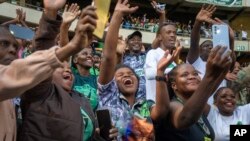 Supporters cheer former South African President Jacob Zuma as he arrives at Orlando stadium in the township of Soweto, Johannesburg, South Africa, May 18, 2024. 