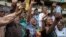 Supporters cheer former South African President Jacob Zuma as he arrives at Orlando stadium in the township of Soweto, Johannesburg, South Africa, May 18, 2024. 