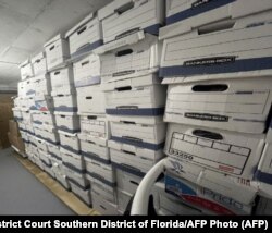 This undated image, released by the U.S. District Court Southern District of Florida, attached as evidence in the indictment against former U.S. President Donald Trump shows boxes stored allegedly at Mar-a-Lago, the former presidents private club.