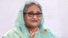 Sheikh Hasina, Prime Minister of Bangladesh and Chairperson of Bangladesh Awami League, shows a victory sign while speaking to the press in Dhaka, Bangladesh, January 7, 2024. Prime Minister's office/Handout via REUTERS