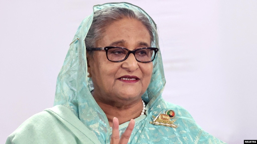 Sheikh Hasina, Prime Minister of Bangladesh and Chairperson of Bangladesh Awami League, shows a victory sign while speaking to the press in Dhaka, Bangladesh, January 7, 2024. Prime Minister's office/Handout via REUTERS