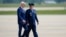 U.S. President Joe Biden, escorted by 89th Airlift Wing Commander, Air Force Colonel Matthew Jones, walks to Air Force One at Andrews Air Force Base, Maryland, May 17, 2023, for his trip to Hiroshima, Japan, to attend the G7.