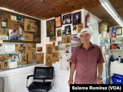 Wilfredo Perez, owner of the Perez barbershop, which he founded 40 years ago in the same place where he continues to serve the community today. (Salome Ramirez/VOA)