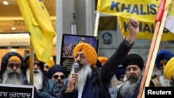 FILE - Demonstrators protest outside India's consulate, a week after Canada's Prime Minister Justin Trudeau raised the prospect of New Delhi's involvement in the murder of Sikh separatist leader Hardeep Singh Nijjar, in Vancouver, British Columbia, Canada Sept. 25, 2023. 