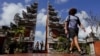 Penumpang tiba di Bandara Internasional I Gusti Ngurah Rai Badung, Bali, 2 September 2022. (Foto: REUTERS/Willy Kurniawan)